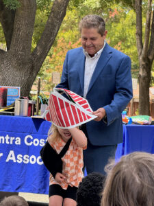 magician with young girl