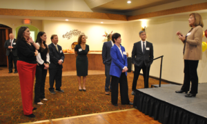 A group of new judges gather to listen to Judge Jill Fannin (Ret.) speak.